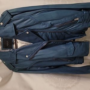 Leather hacket. Aqua or teal in color. Size large. Never wore.